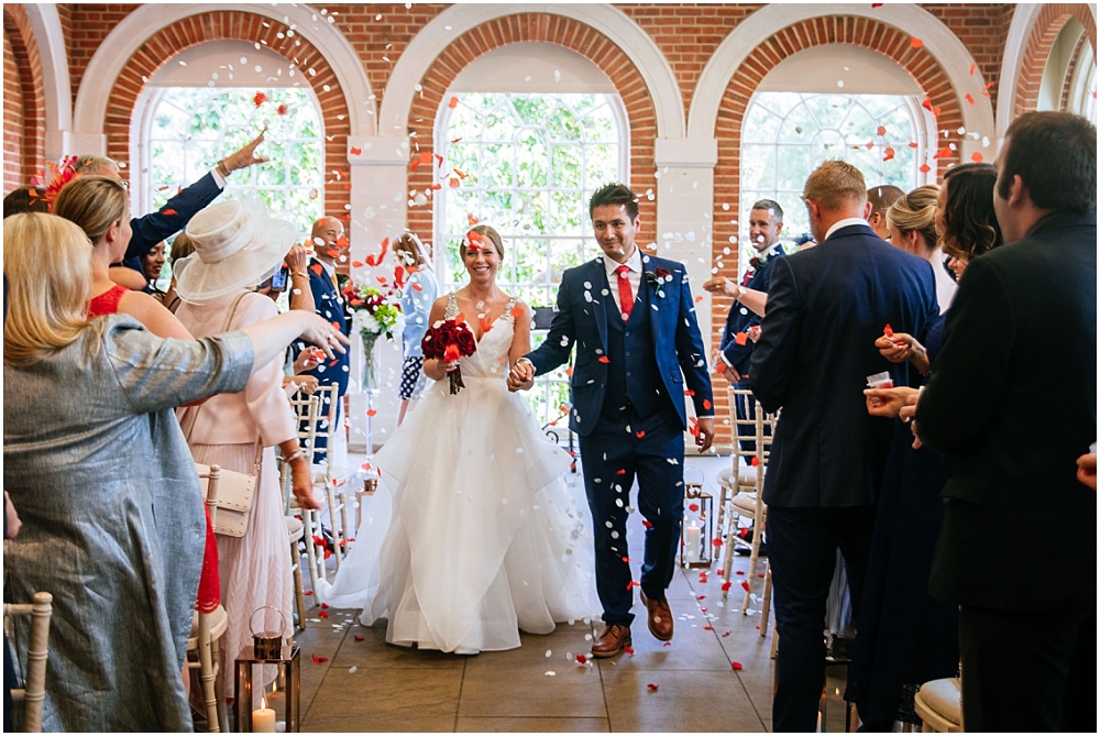 walking back down aisle to confetti