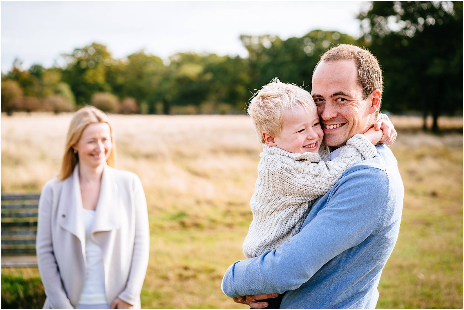 Smiling family in bushy park
