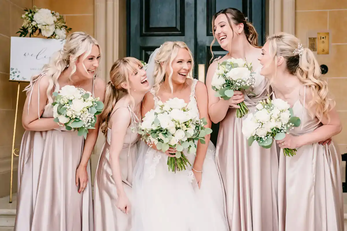 Wedding Blog - Laughing bride and bridesmaids