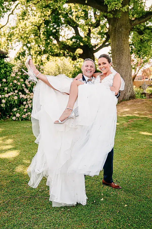 What happens after booking - Groom carrying bride
